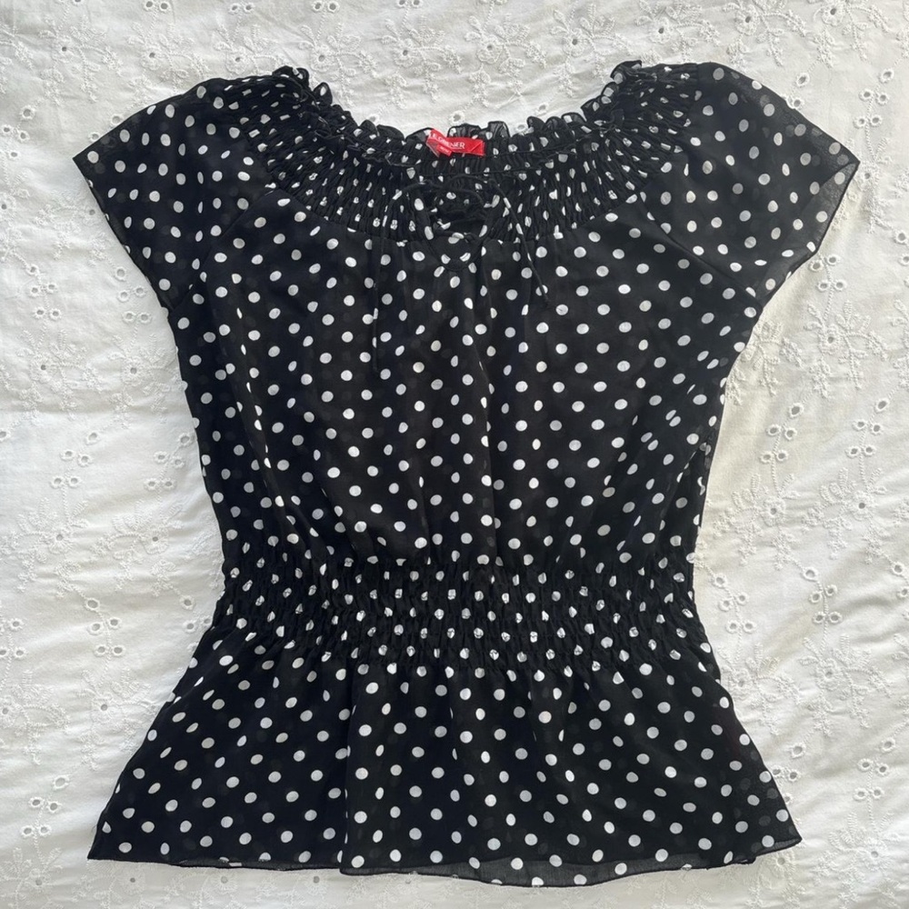black and and white polka dot top mesh top with cinched waist and lace up front